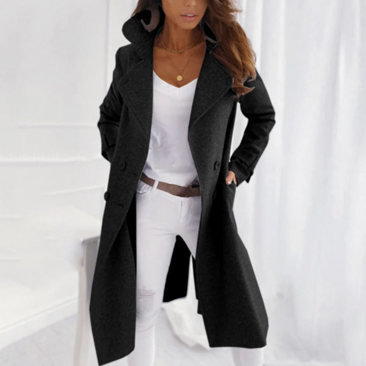 Ladies' elegant coat with a unique turned collar and relaxed loose fit, suitable for seasonal comfort.