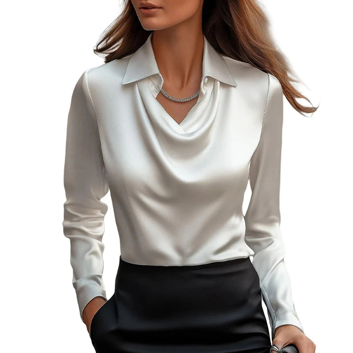 Draped elegant women's cowl neck blouse with lustrous high sheen, a sophisticated long sleeve evening top.