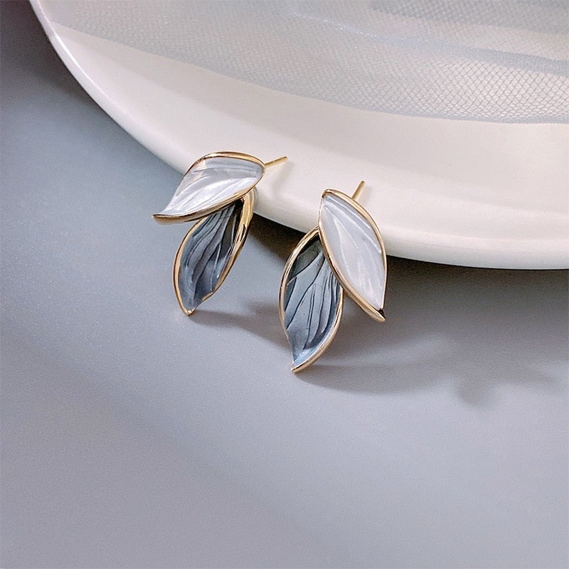 Elegant women's luxury enamel lucky wing earrings. Hand-painted, symbolic, and a fashionable statement gift for her.