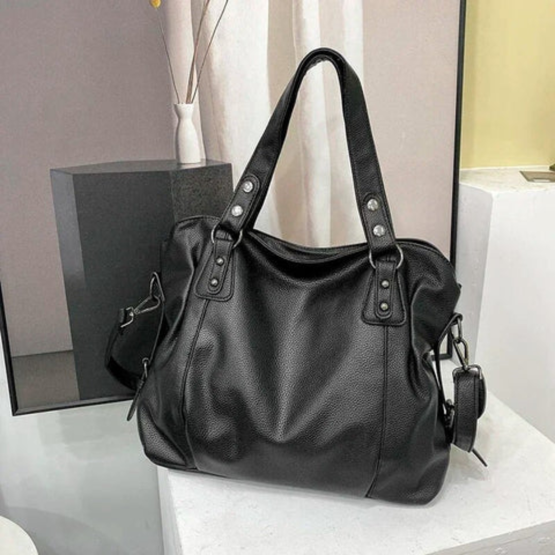 Luxurious women's leather shoulder bag. Elegant, versatile, and spacious; perfect designer quality everyday tote.