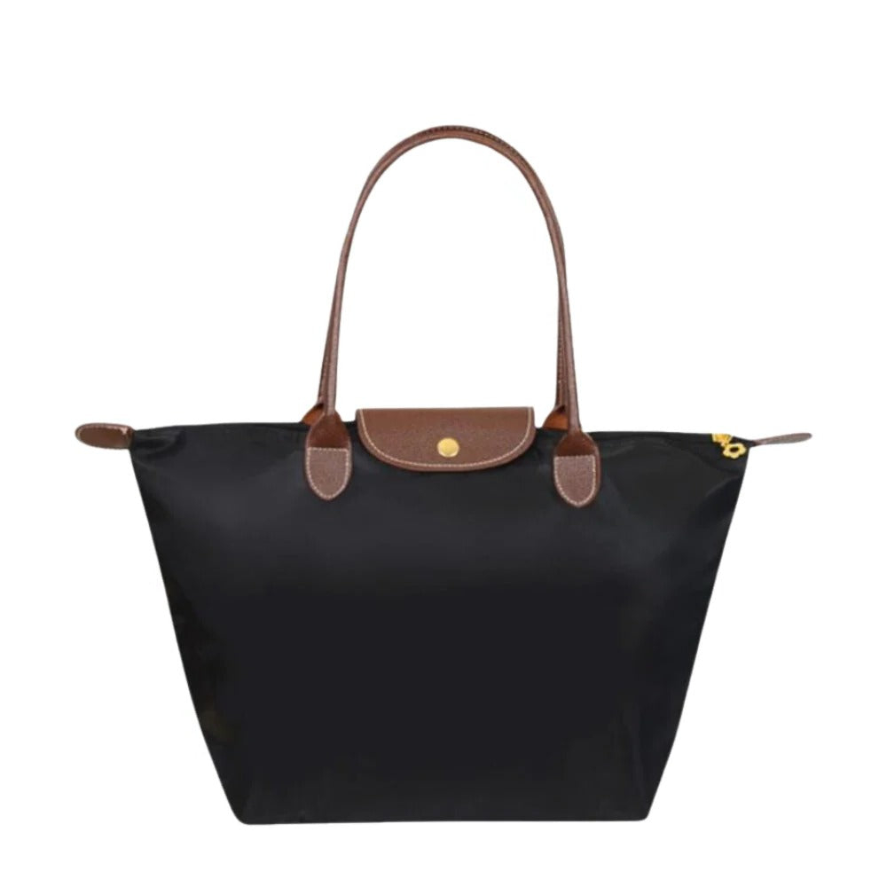 Elegant women's luxury top handle bag in synthetic leather, perfect for everyday carry and fashion.