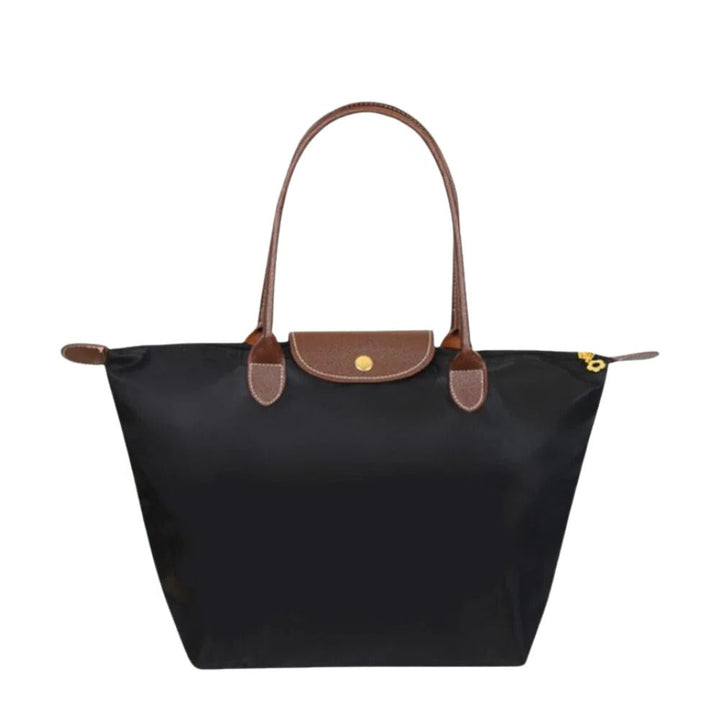 Elegant women's luxury top handle bag in synthetic leather, perfect for everyday carry and fashion.