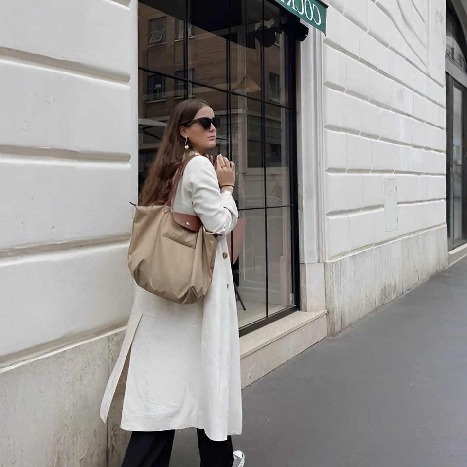 Sophisticated women's luxury top handle bag, premium synthetic leather, an elegant and versatile handbag.