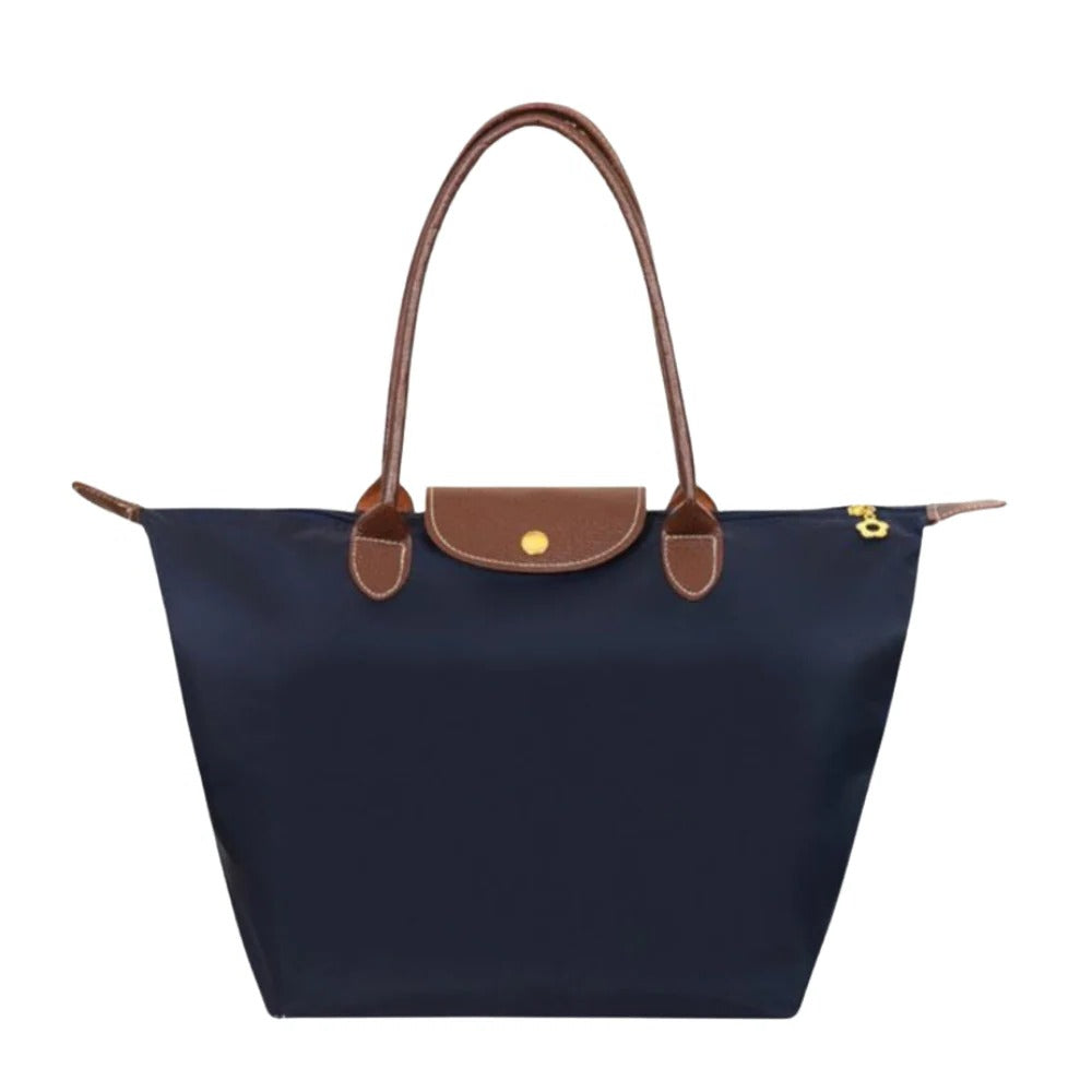 Luxury synthetic leather top handle handbag for women, designer quality with elegant detailing.