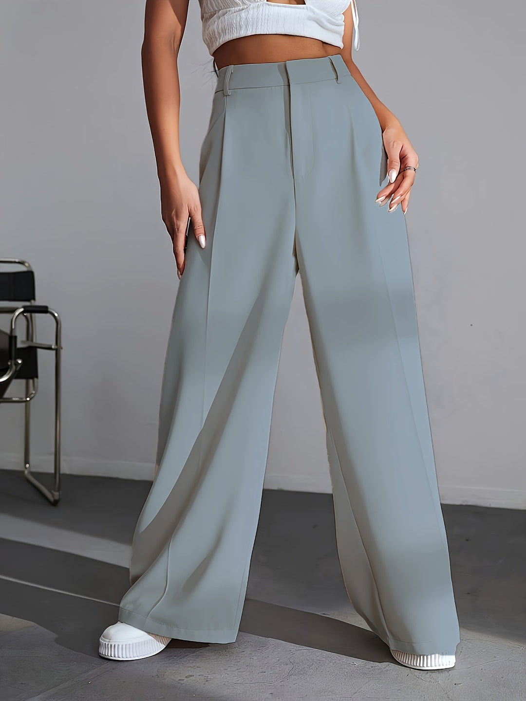 Soft & comfortable Lana wide leg luxury trousers for women in a solid color, featuring an elegant relaxed fit.