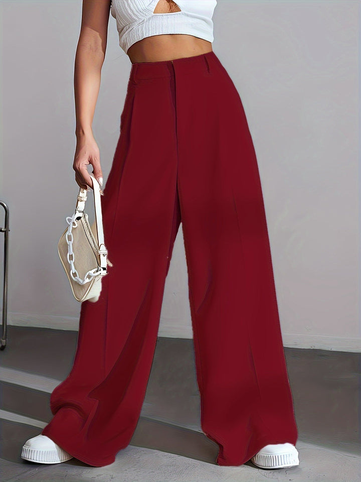 Modern women's luxury wide leg pants, solid color, offering a chic & comfortable relaxed fit for sophisticated fashion.