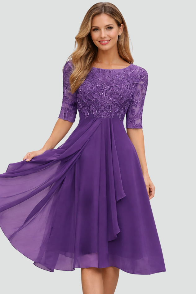 Women's flowing midi dress, elegant three-quarter sleeves. Perfect formal or evening party wear. Special occasion attire.