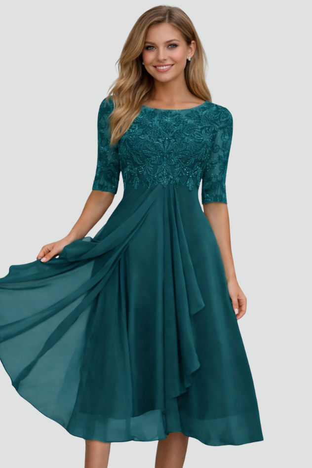 Effortlessly graceful women's elegant midi dress. Perfect for evening, formal, or cocktail parties. Three-quarter sleeves.