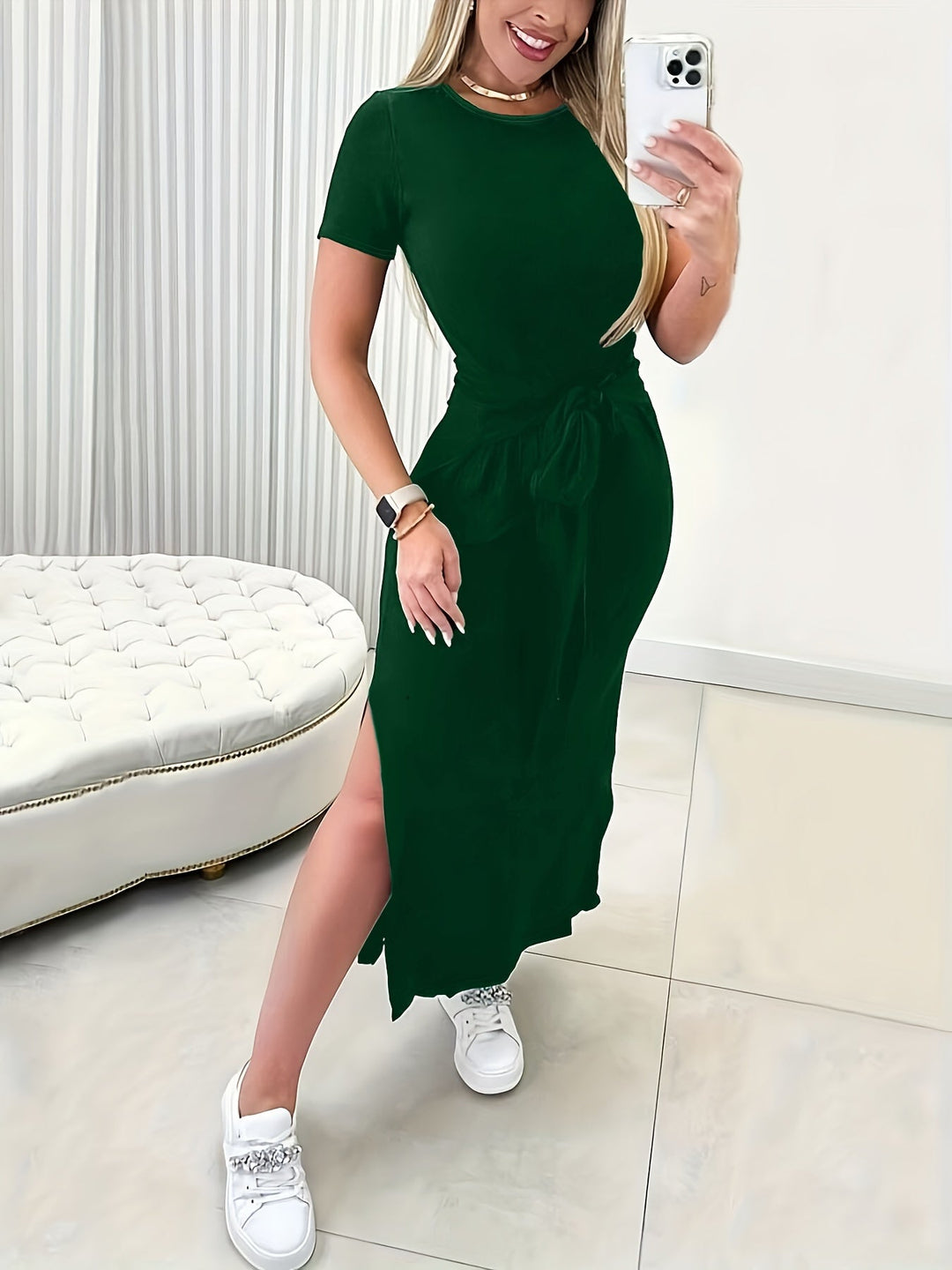 Fashionable women's polyester midi dress with waist belt, designed for comfortable and elegant summer wear.