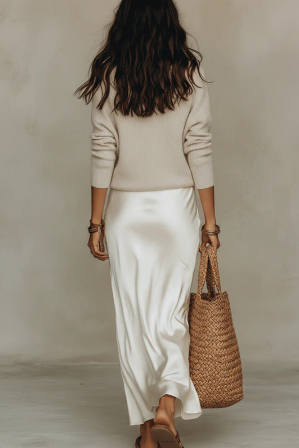 Stylish two-piece women's sweater set featuring a chic midi dress, ideal for an elegant & versatile layered look.