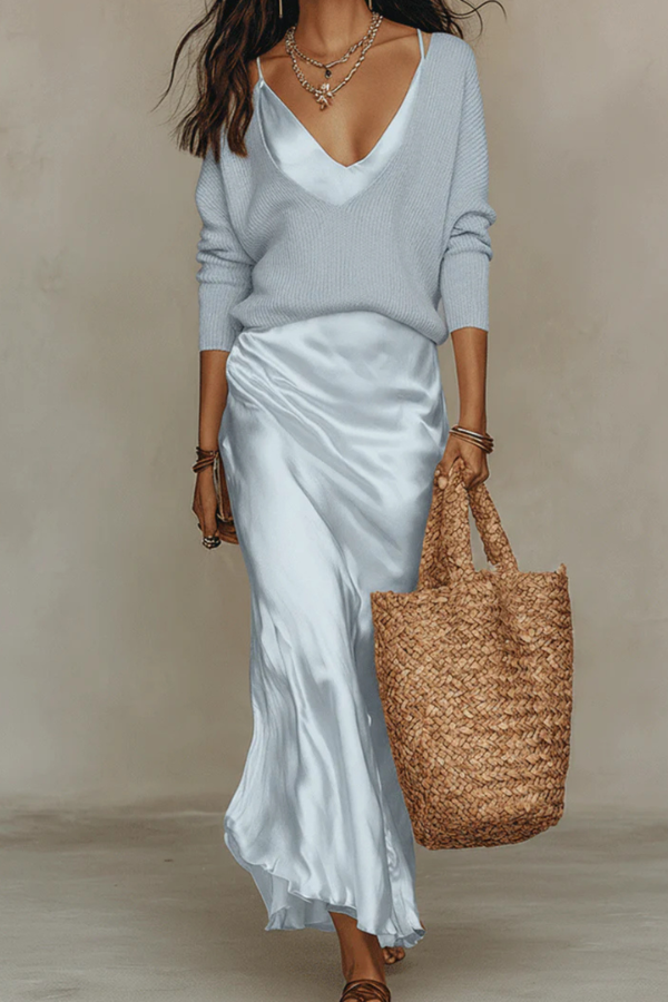 Sophisticated women's elegant midi dress & soft knit sweater set, perfect for a comfortable yet stylish layered look.