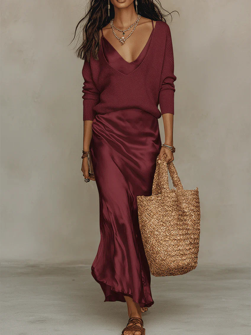 Fashionable women's midi dress & sweater set, perfect for a casual elegant outfit.