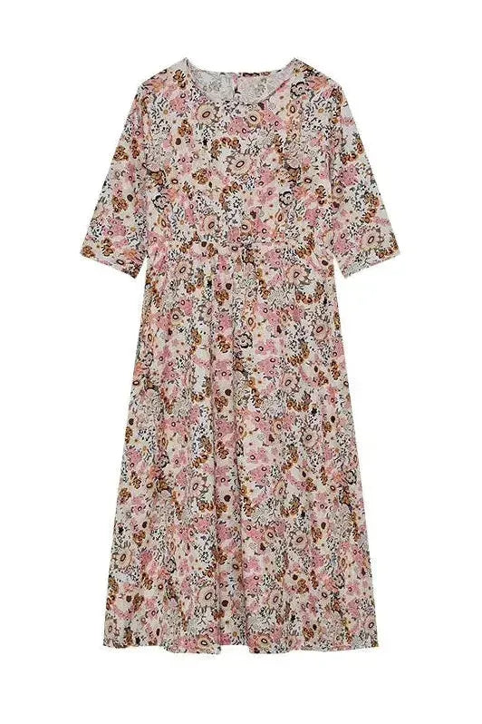 Flattering women's midi dress with elegant button accents. Comfortable classic style for chic day or night fashion.