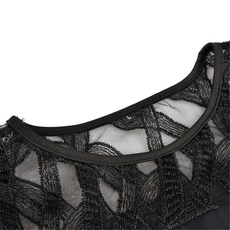 Chic women's midi dress in black, featuring elegant lace sleeves and a flattering round neck for evening wear.