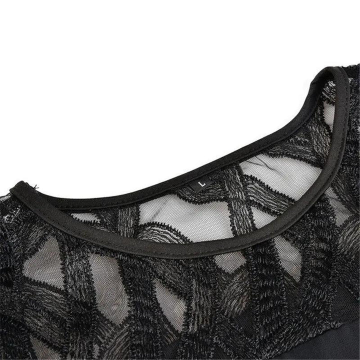 Chic women's midi dress in black, featuring elegant lace sleeves and a flattering round neck for evening wear.