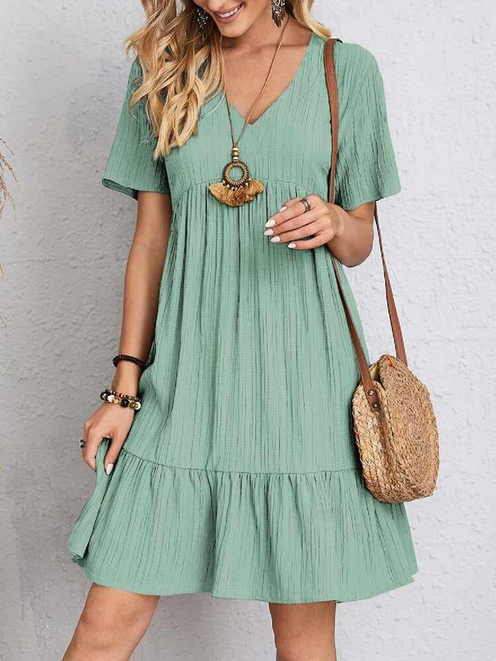 Sleek women's midi dress with effective tummy control, providing a flattering and elegant silhouette.