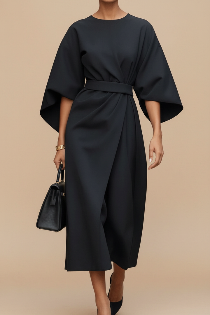 Classy women's midi dress with elegant lantern sleeves, ideal for formal gatherings.