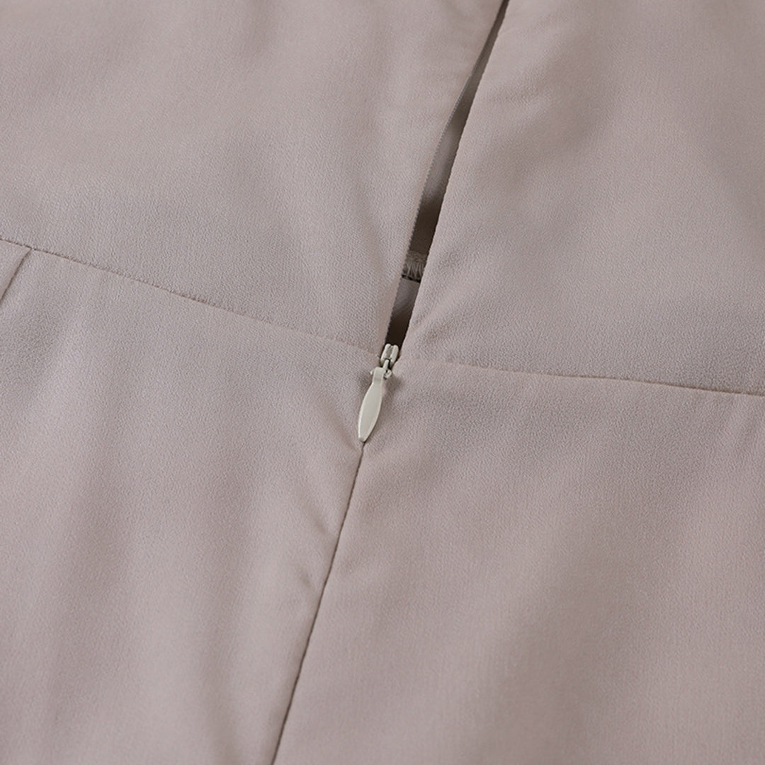Comfortable & elegant women's midi dress with spaghetti straps, perfect for a night out.