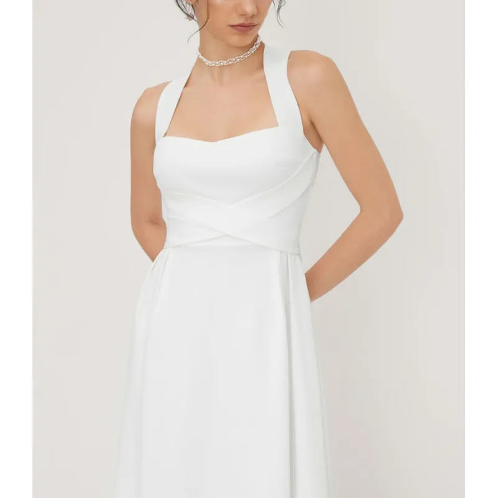 Square neck midi dress for women, featuring a distinctive cross-waist design, creating an elegant silhouette.
