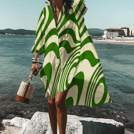 Women's chic printed midi dress featuring a unique pattern, a stylish long sleeve dress.