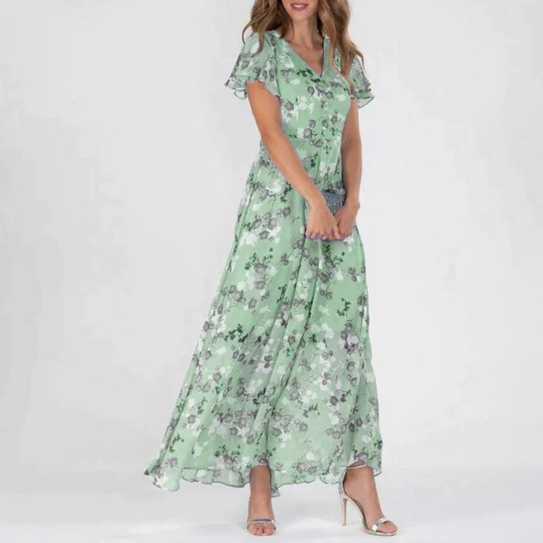 Elegant women's midi floral dress with V-neck, perfect for spring/summer events. Versatile and stylish.