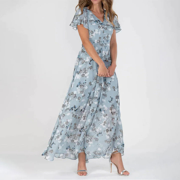 Chic V-neck floral midi dress for women. Effortlessly elegant, perfect for spring and summer fashion occasions.