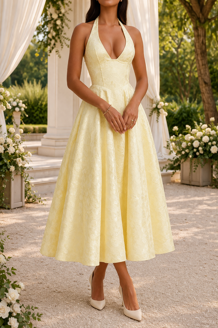 Formal women's midi dress with a flattering halter neck and fitted waist, suitable for elegant events & parties.