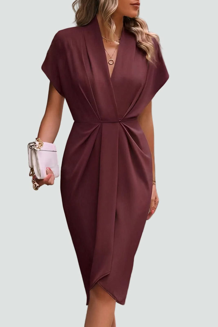 Women's flattering wrap midi dress, an elegant V-neck design for comfort & sophisticated style.