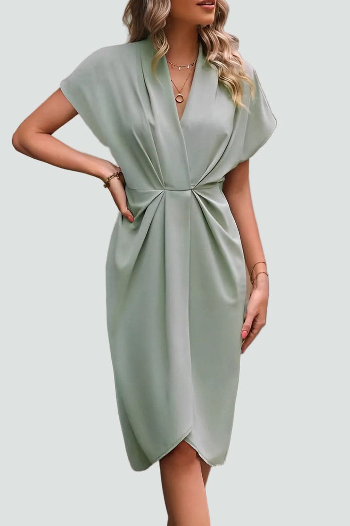 Sophisticated women's midi wrap dress, great for cocktail parties, dinners, or evening events.