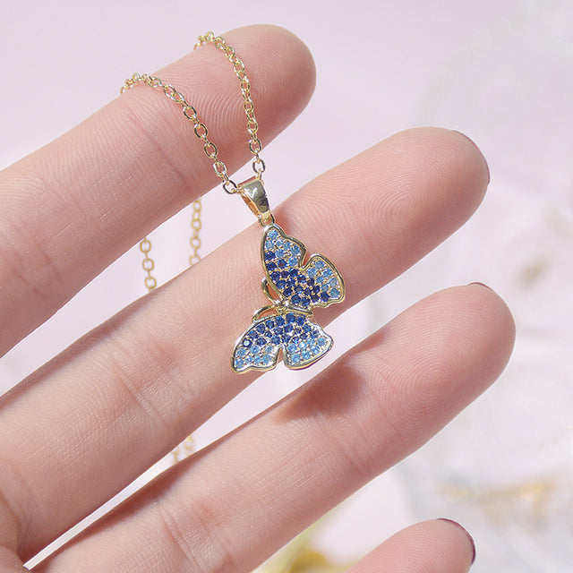 Versatile women's mini pearl charm necklace. Short butterfly necklace, perfect for any occasion or as a gift.