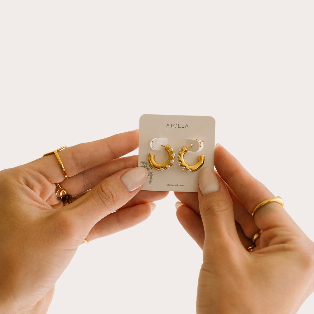 Delicate mini pearl earrings for women, gold plated. Elegant, water-resistant, hypoallergenic everyday fashion.