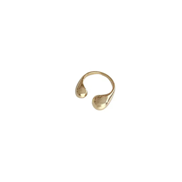 Elegant women's minimalist adjustable ring, gold plated, perfect for stacking. Hypoallergenic everyday jewelry.