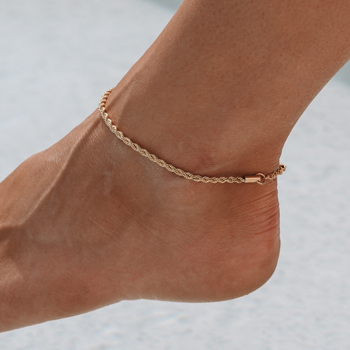 Women's minimalist chain anklet. Elegant & adjustable gold or silver foot jewelry accessory for women.