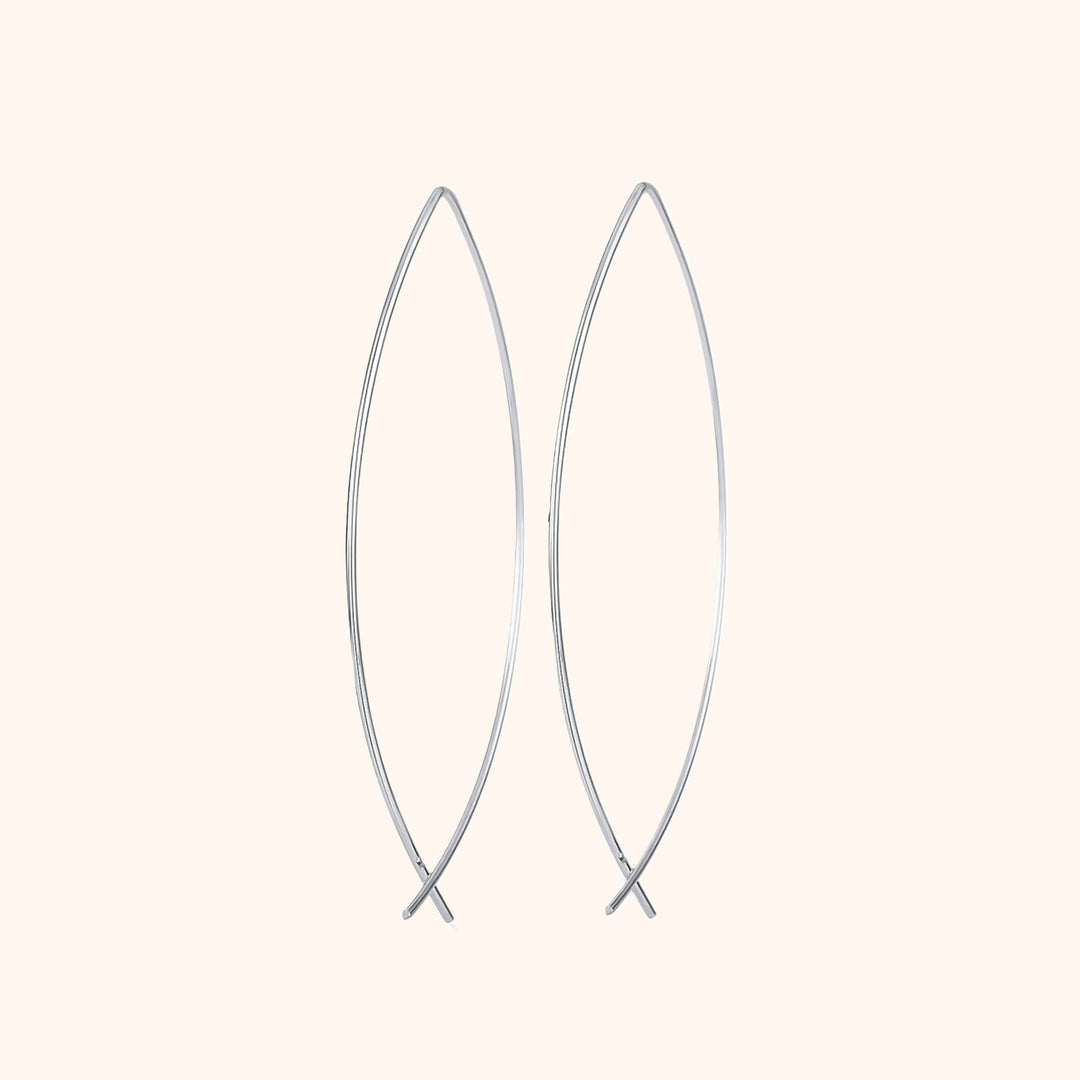 Elegant women's minimalist hoop earrings in polished silver. Perfect everyday fashion jewelry.