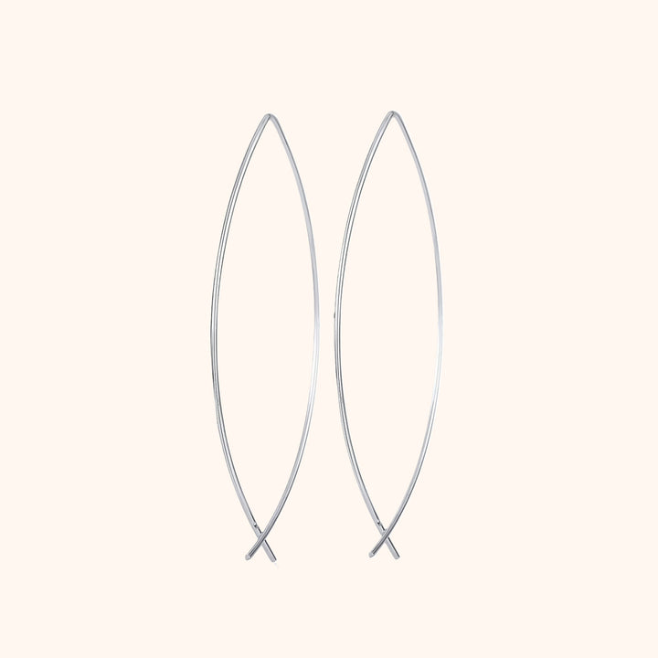 Elegant women's minimalist hoop earrings in polished silver. Perfect everyday fashion jewelry.