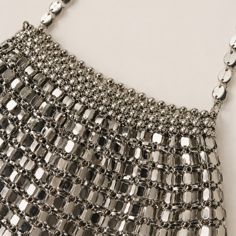 Stylish metallic mesh shoulder bag, a dazzling party purse for women. Make a statement with this glitter evening bag.