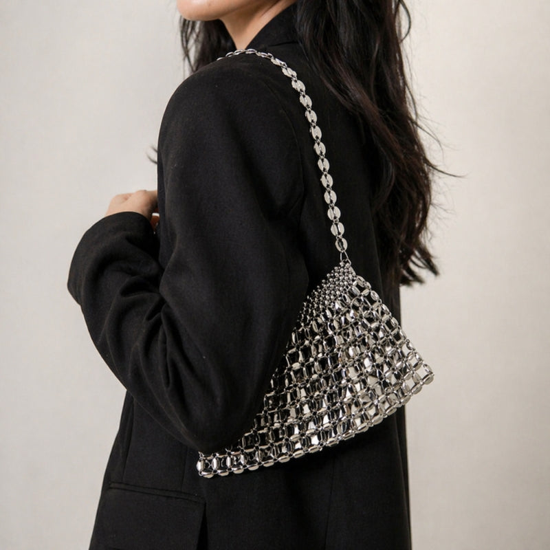 Women's metallic mesh shoulder bag with mirrored details. Ideal elegant evening bag or glitter party purse.