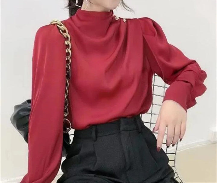 Modern women's mock neck long sleeve ruched top, designed for a polished and elegant look in any setting.