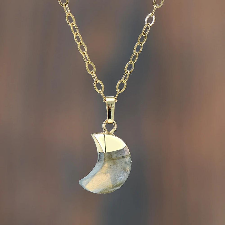 Elegant women's Moonstone healing crystal necklace, a spiritual gemstone for well-being.