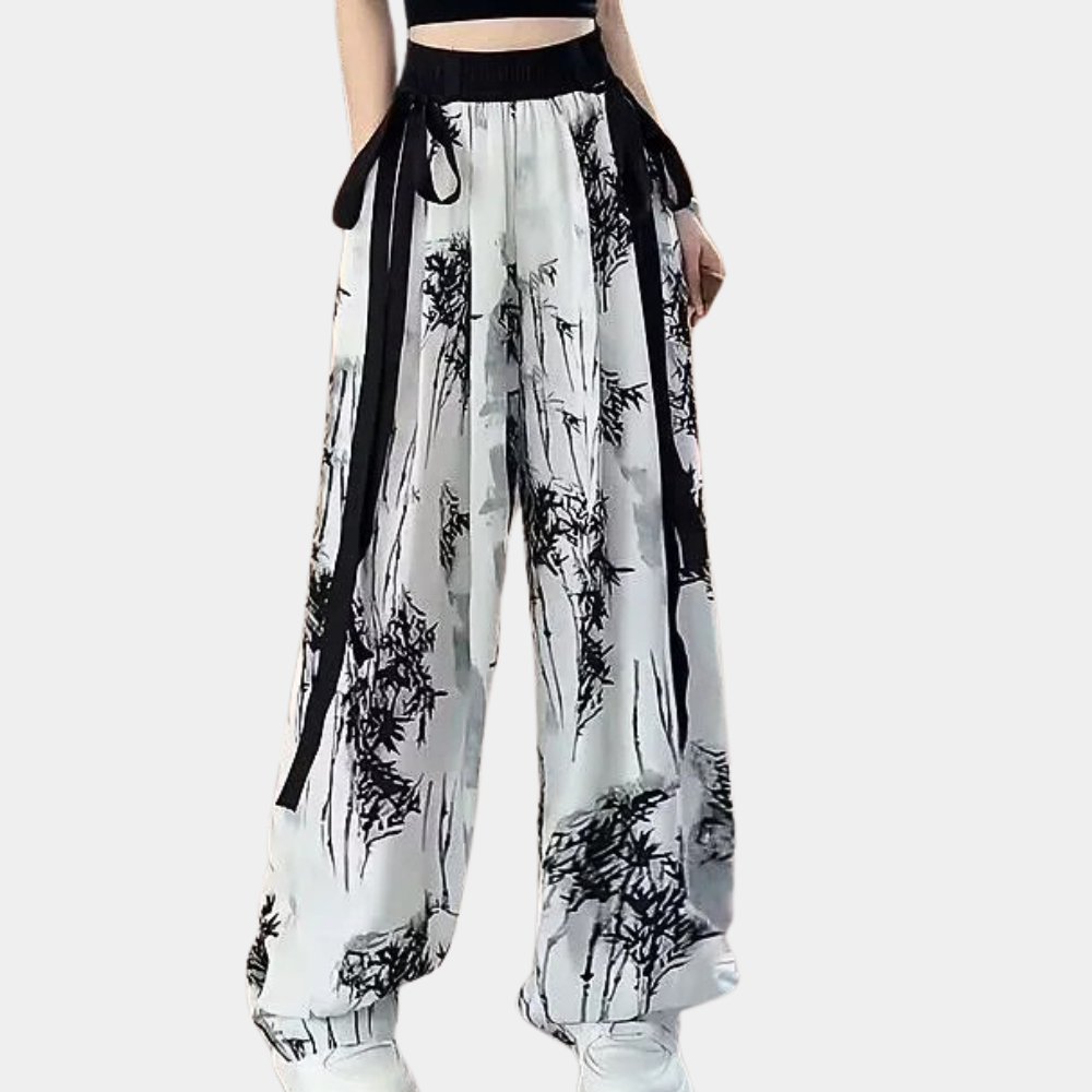 Elegant Women's Naomi trousers, versatile for office or casual wear, featuring a stylish white print & comfortable polyvinyl.