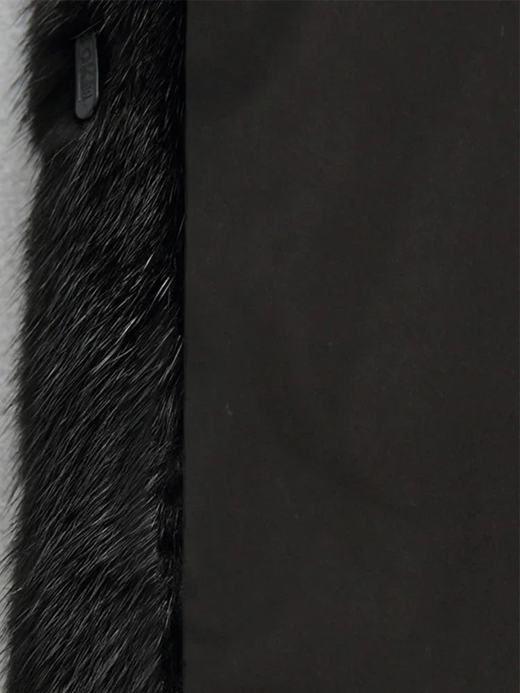 Stylish women's Napoli long winter coat. Elegant, plush, and warm outerwear, essential for sophisticated cold weather.