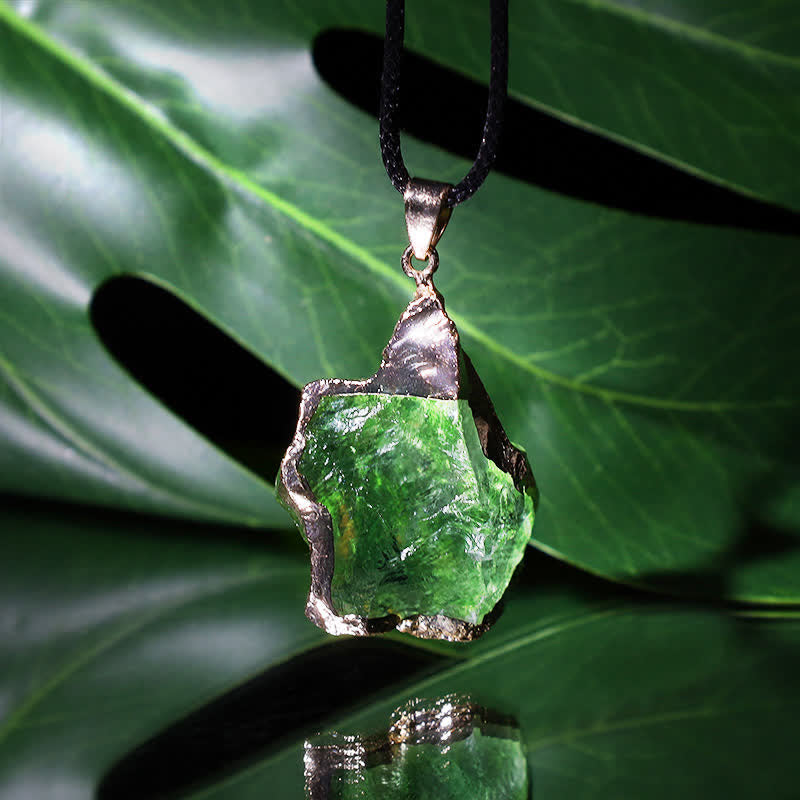 Elegant women's Natural Moldavite necklace, a unique cosmic green gemstone pendant. Spiritual jewelry gift.