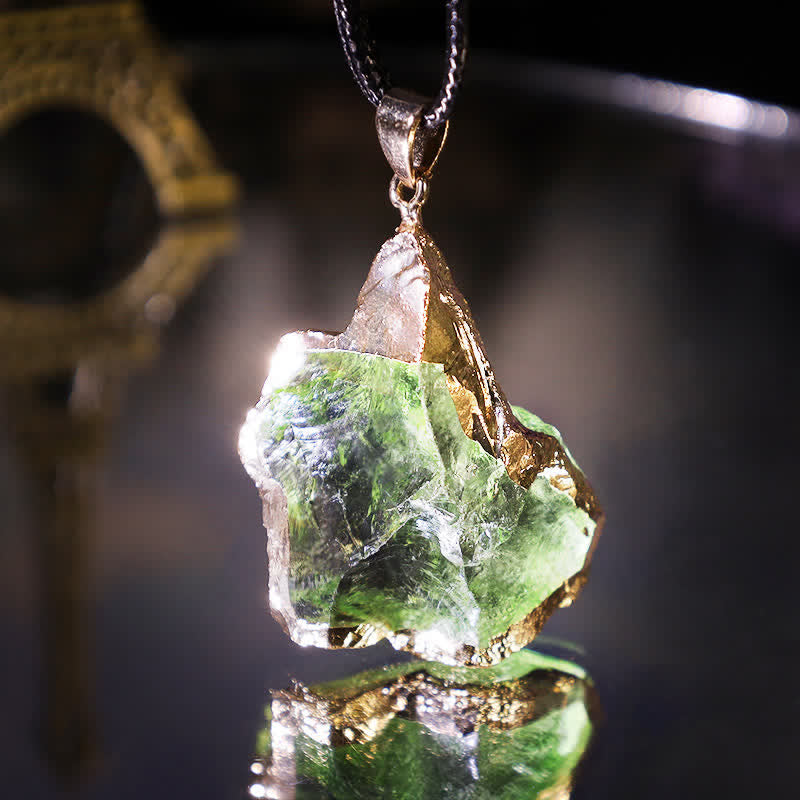 Women's Natural Moldavite necklace, a stunning cosmic green gemstone pendant. Elegant spiritual jewelry.