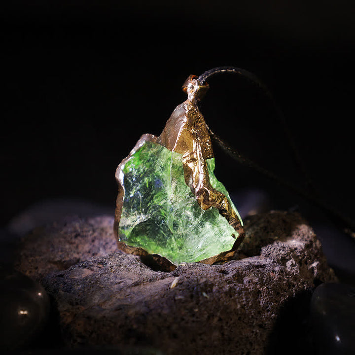 Elegant Natural Moldavite pendant necklace for women, a spiritual gemstone with unique cosmic energy.