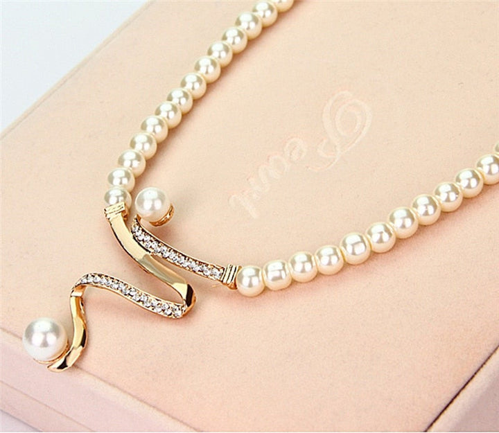 Lustrous natural pearl necklace & earrings. A complete women's jewelry set, ideal for elegant, timeless style.
