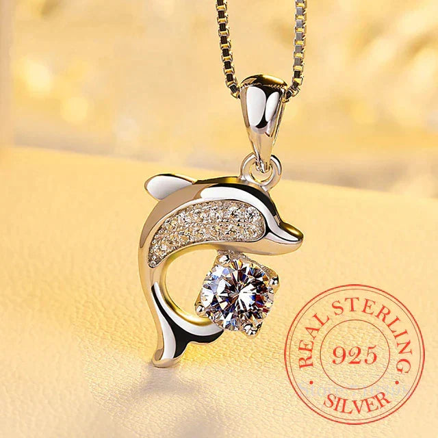 Elegant women's necklace featuring a sparkling crystal dolphin pendant in silver. Perfect ocean-inspired jewelry gift.