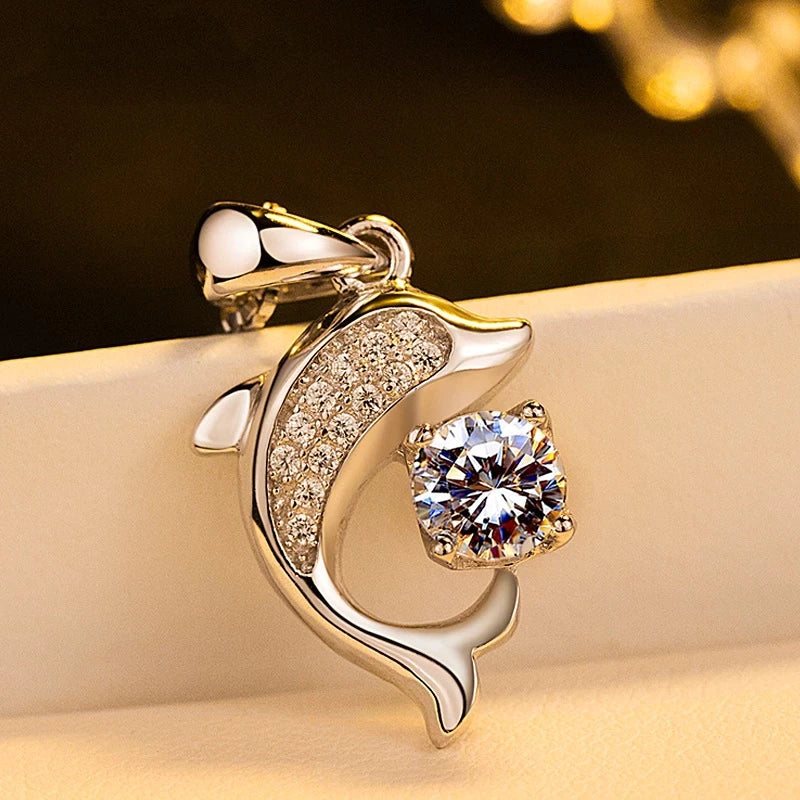 Stunning silver necklace with a radiant crystal dolphin pendant, elegant women's jewelry capturing ocean beauty.