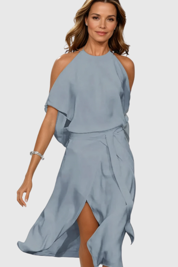 Chic women's off-shoulder midi dress with an asymmetric hem. Ideal elegant evening wear & party dress.