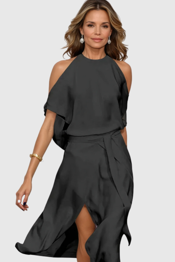 Modern off-shoulder asymmetric midi dress for women. Stylish and elegant for cocktails, parties, or summer events.