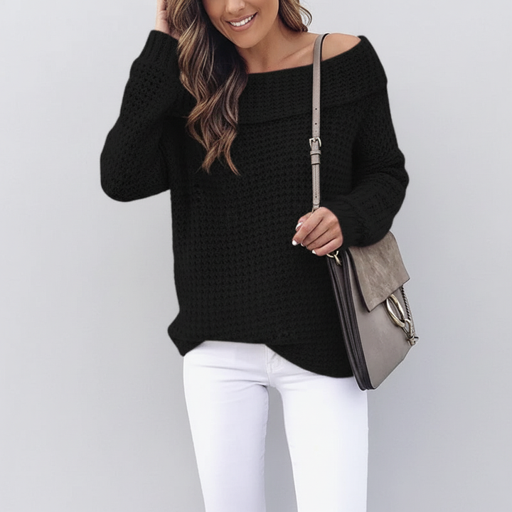Model wearing an elegant off-shoulder knit sweater, demonstrating its comfortable loose fit and autumn wear style.